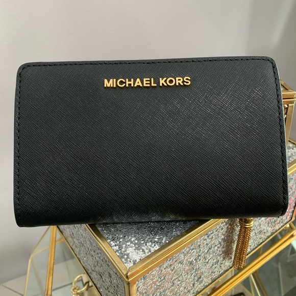 Michael Kors Handbags - Michael Kors Jet Set Travel Slim Bifold Wallet